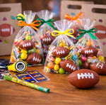 Side view comparison of the mini football next to everyday objects to highlight its compact size