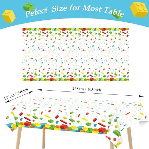 Three pieces of disposable lego theme table covers laid out for a kids birthday party setup