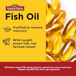 Side view of Nature Made Extra Strength Fish Oil bottle detailing purity standards and wild-caught sourcing information.