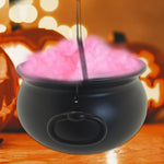 Guaber decorative cauldron filled with candies