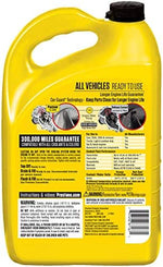 Prestone Extended Life 50 50 Coolant pack of six bottles arranged for automotive workshop storage.