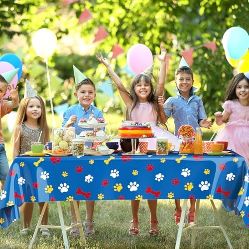 Gilprop disposable plastic tablecloth shielding a wooden dining table from party spills
