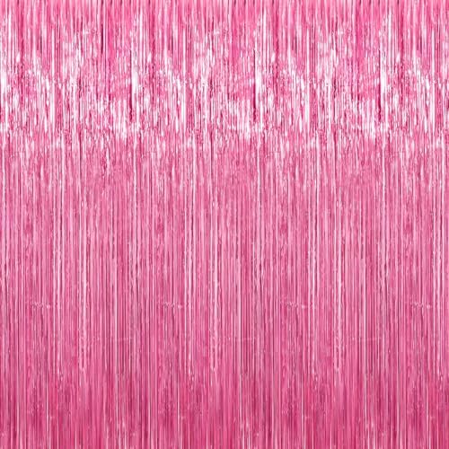 Crosize three pack pink tinsel door streamers installed on a party wall