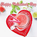 Whimsical pink heart straws inserted into romantic bridal shower drink cups