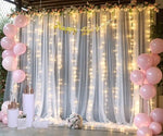 Suppromo white backdrop curtain showing the built in four inch rod pocket for easy background stand mounting