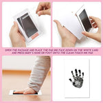 Outus pet memorial kit highlighting the orange and pink inkless impression pads side by side.