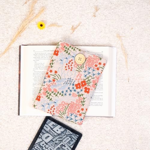 Zosiana Designs floral sleeve held in hand for size reference