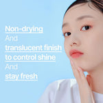 ETUDE matte finish translucent powder being applied to face with puff
