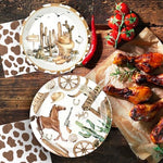Close up of rustic horse and cactus print on cowboy party paper plates.