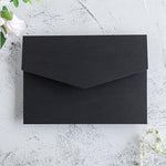 Premium matte black cardstock invitation sleeves by FEIYI styled with an optional ribbon wrap