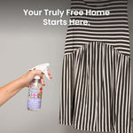 Close up of Truly Free laundry spray showing plant based ingredients for fabric refreshing.