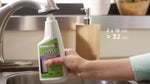 Side view of 16 fluid ounce Affresh bottle highlighting mineral buildup removal benefit