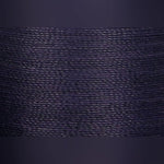Close up of Navy hand quilting thread spool label and color
