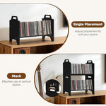 Assembled matte black dual pack disc holder tower highlighting quick independent case access