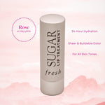 Fresh Rose Lip Treatment bullet extended showing pink tint