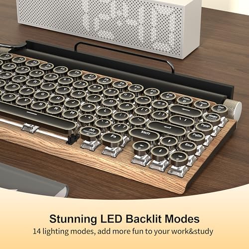 Side profile of Taiahiro mechanical keyboard showing volume and brightness knobs