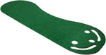 Golfer practicing short game strokes on the Grassroots putting green
