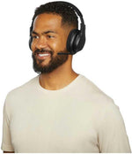 Belkin SoundForm Adapt headset showing built-in boom microphone