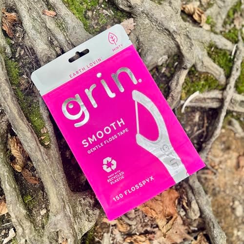 Grin gentle floss tape picks displaying the flat smooth profile engineered for tight teeth