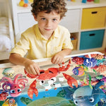 Durable cardboard floor puzzle packaging displaying sea turtle cartoon design