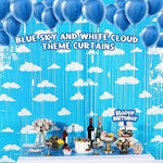 Three pieces of sky blue and white cloud pattern background curtains hanging on a doorway