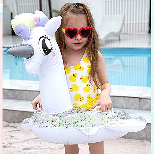 Toddler using Cicitoywo unicorn pool float in water