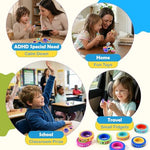 Compact one inch travel calm essential sensory rings shown next to everyday pocket items.