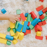 Toddler sorting toy featuring one hundred wooden blocks in four colors and nine shapes.