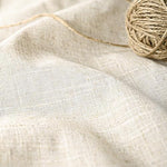 Close up view of the beige and gray striped patterns showing the intricate woven texture.