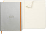 Rhodia notebook open to lined Clairefontaine ivory paper pages