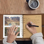 Sucarlon premium leather memory book showing snap-button closure strap