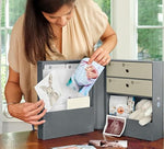 Savor baby keepsake box styled on a bookshelf for modern decor