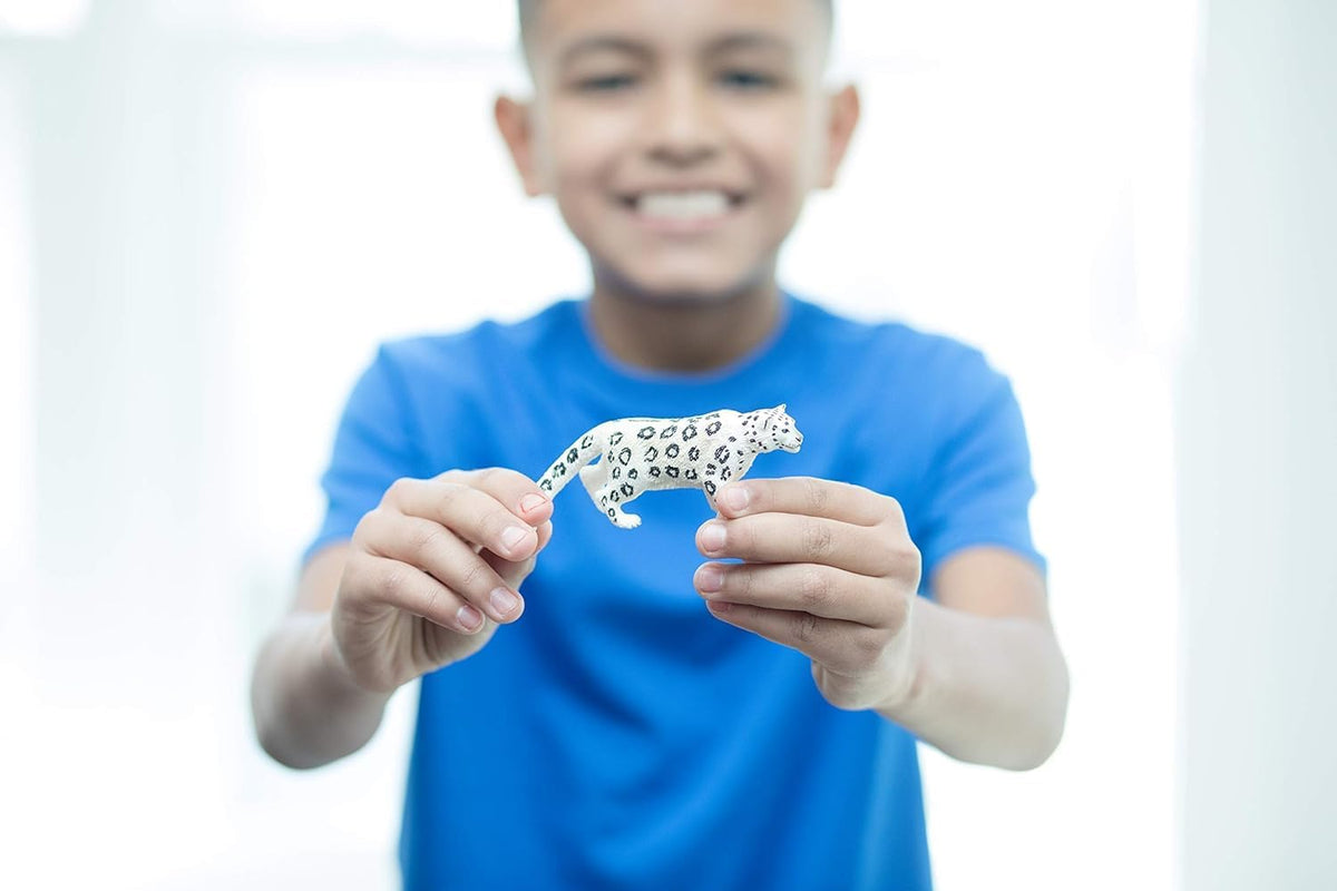 Schleich snow leopard model showing textured fur details