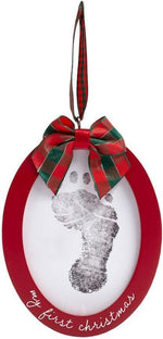 Double sided infant holiday keepsake frame displaying baby print on the reverse side