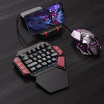 MageGee gaming keyboard connected to a computer setup