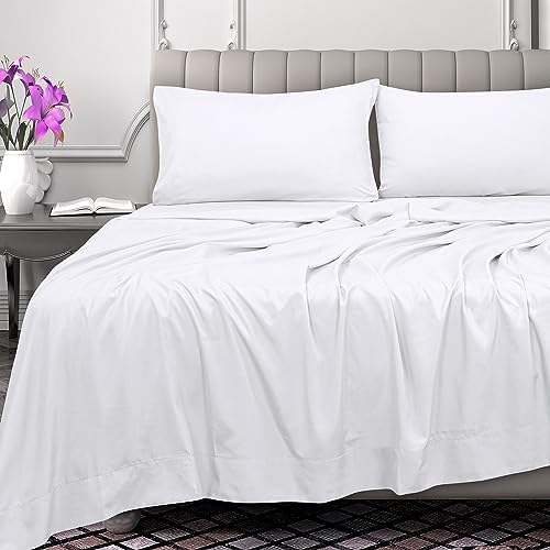 Close up view of the elegant four inch Z hem piping on the white cotton top sheet.
