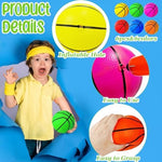 Child holding a 5 inch mini basketball for scale