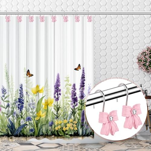 Gifzaa pink bow decorative rings used as lifestyle hangers for accessories in a bedroom setup.