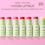 Pixi tinted hydrating lip balm in clear shade opened to show the smooth buttery texture.