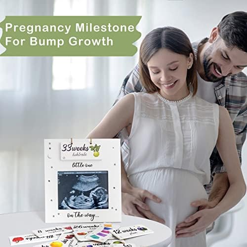 Jwitao first ultrasound photo frame displayed on a tabletop next to a nursery decoration