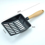 Ergonomic wooden handle of Egmehoad metal cat litter scoop for large cats.