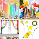 Handmade DIY craft flowers and party fringe created from the multi color crepe paper material.