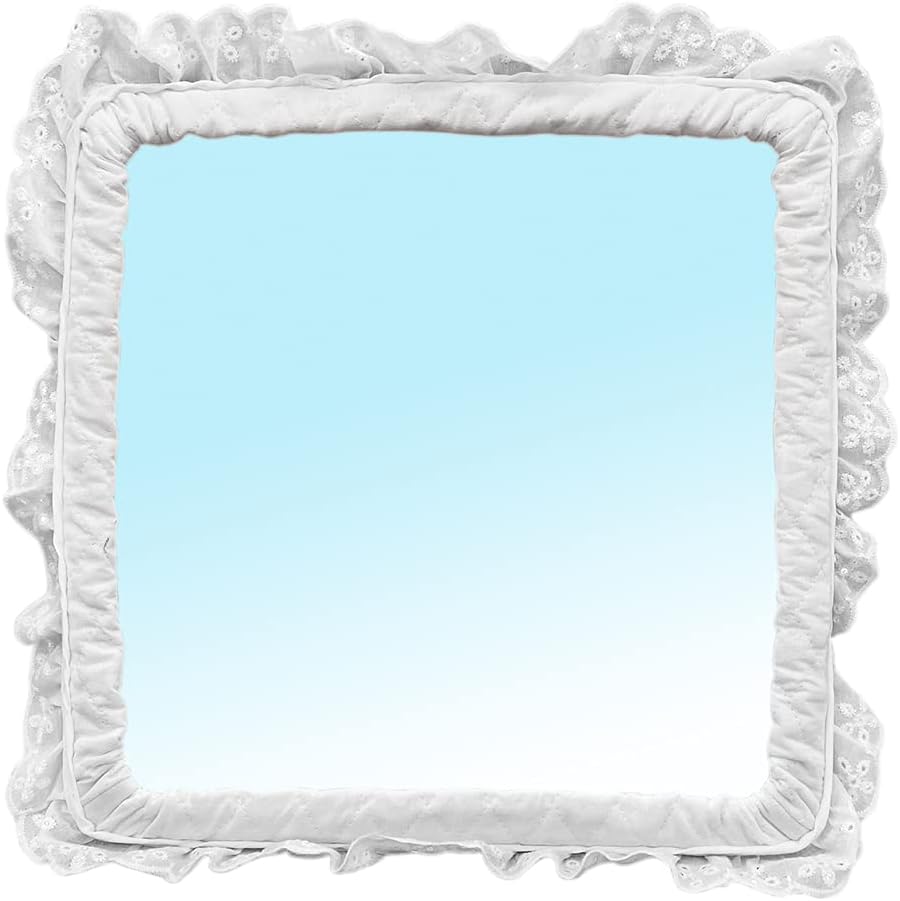 Cribby Baby Mirror front view showing white quilted frame with lace ruffle edging.