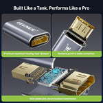 Leenue HDMI coupler connected to gaming console cables