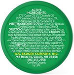 Badger organic DEET-free mosquito repellent balm showing the metal container opened.