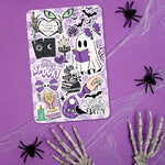 Kindle Paperwhite inside clear case with purple Halloween insert