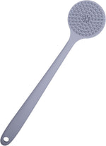 DNC gray silicone back scrubber hanging on a bathroom hook for quick drying