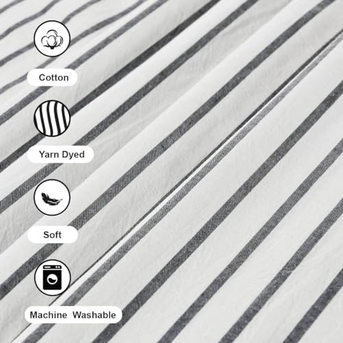 Reinforced top header with twelve buttonholes on the DOSLY IDÉES black and white bathroom curtain.