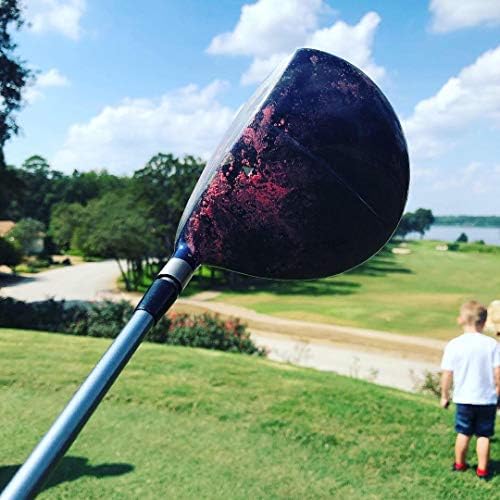 Golf course baby gender announcement with exploding golf balls