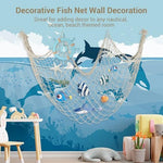 Mediterranean style beige fishing net decor integrated into a festive balloon arch setup.
